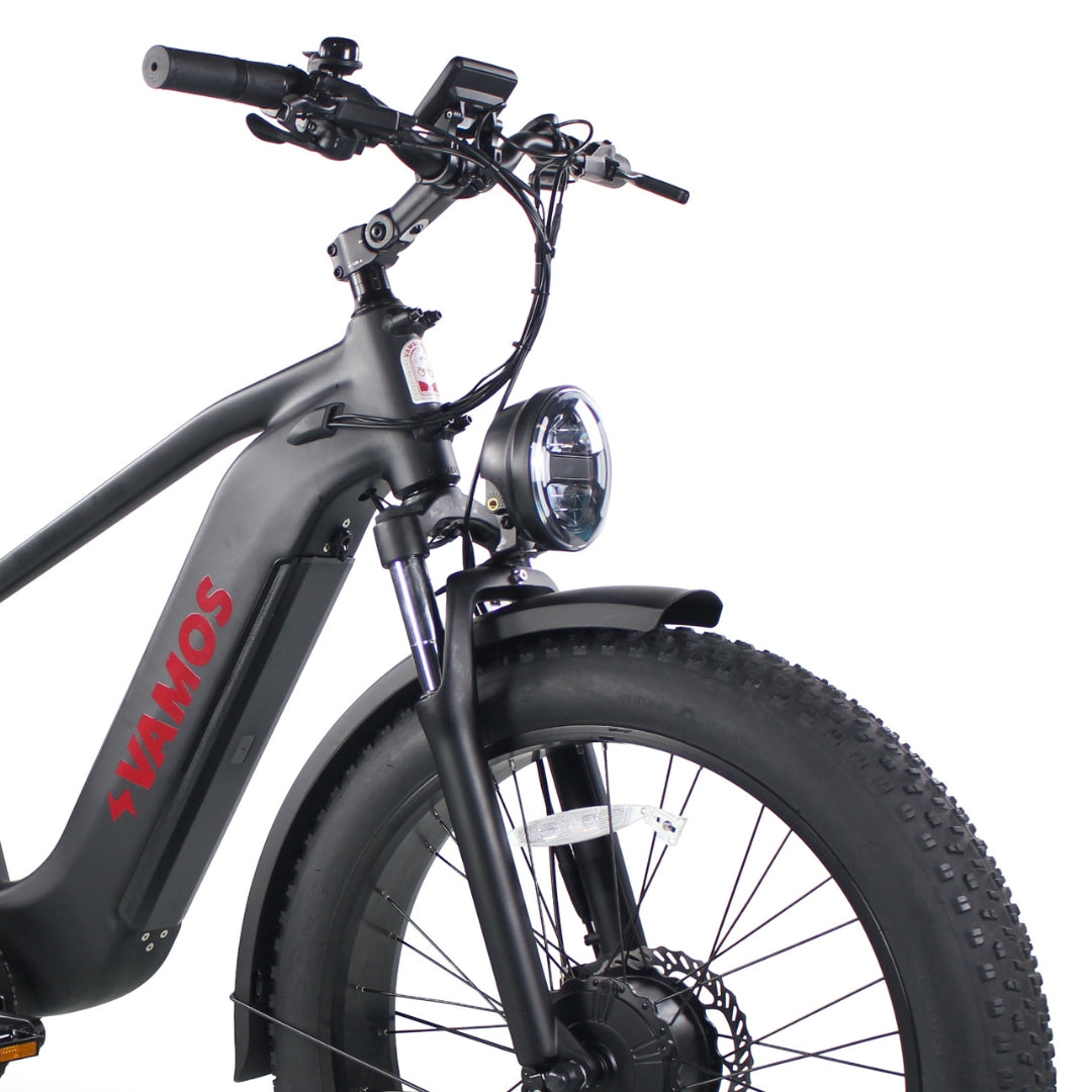 Integrated front and rear lights on Vamos bike image.